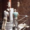 Installation of the column at Du Collège station, 1983