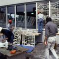 Installation of stained glass at Du Collège station, 1983