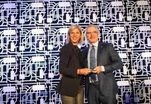 Marie-Claude Léonard giving Luc Tremblay the William G. Ross Lifetime Achievement Award